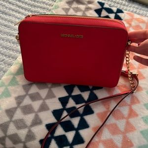 red Michael Kors crossbody